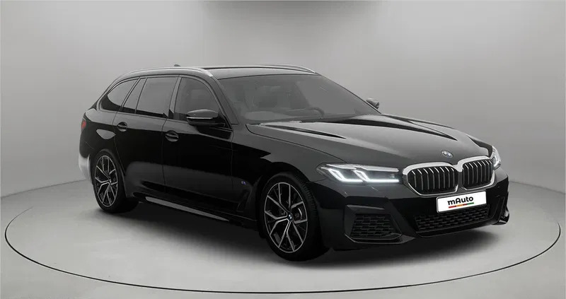 BMW Seria 5 cena 270499 przebieg: 5, rok produkcji 2023 z Łochów